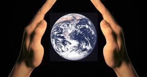 A picture of the earth in two hands.